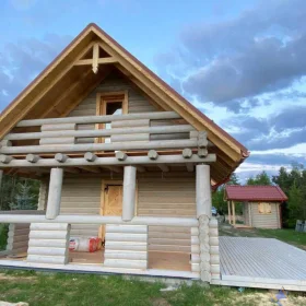Dom z bali okrągłych 70 m2 z dwoma tarasami
